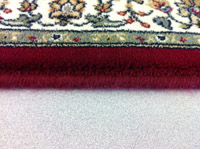 Carpet serging is yarn that is sewn on the edge to keep it from fraying.